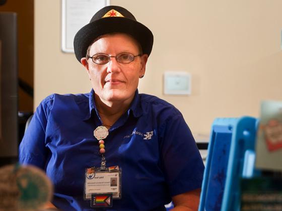 Cancer Patient Sits at he Desk